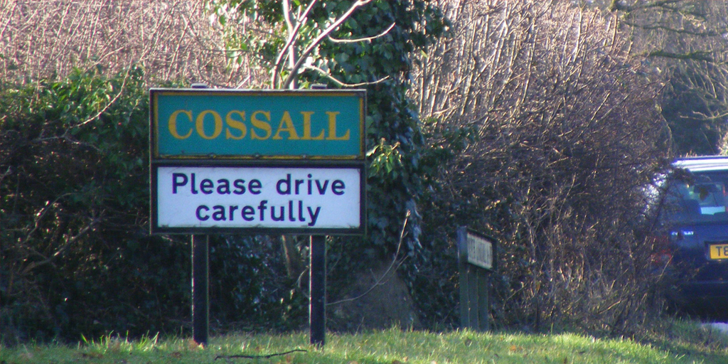 Photo of road-sign reading "Cossall - Please drive carefully"